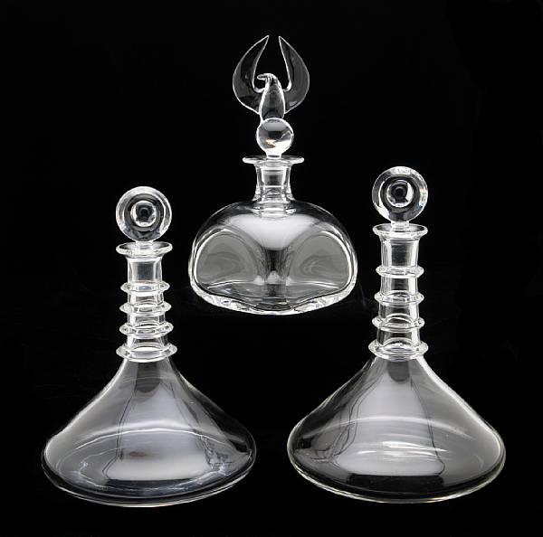 Appraisal: Three Steuben clear glass decanters comprising two ship's decanters shape