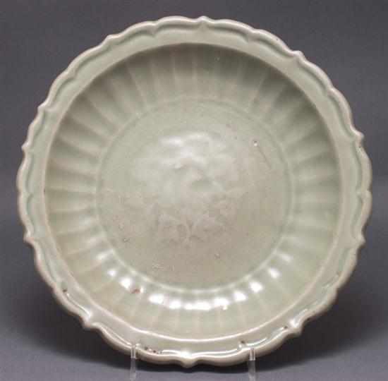 Appraisal: Chinese celadon glaze stoneware scallop rim dish th th century