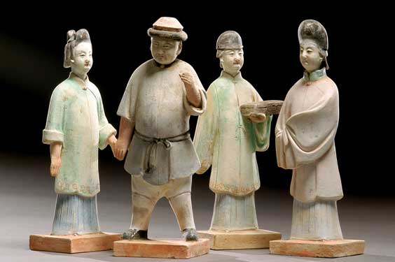 Appraisal: FOUR RARE YUAN POTTERY FIGURES Set of four rare Chinese