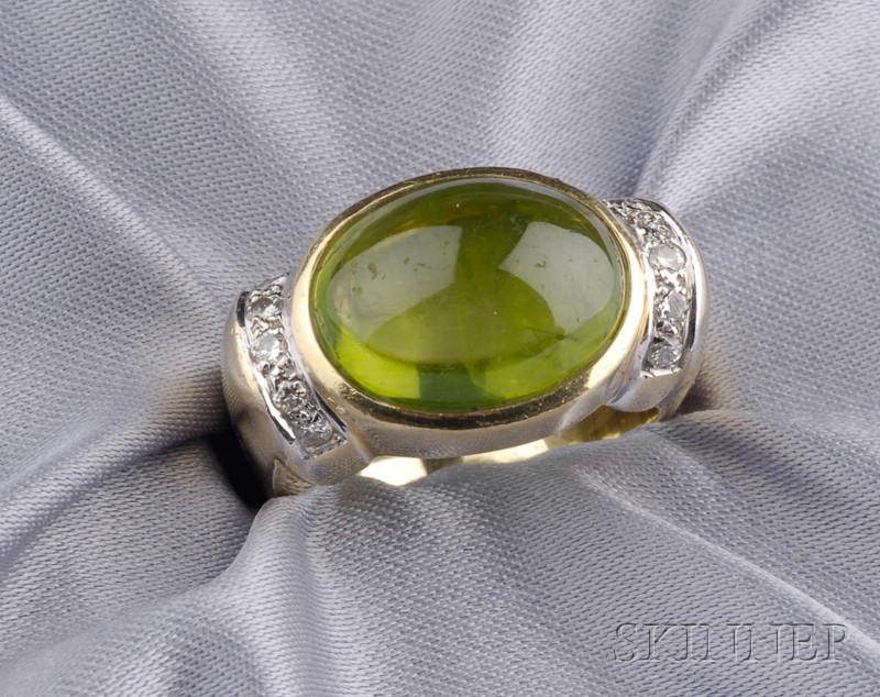 Appraisal: kt Gold Peridot and Diamond Ring bezel-set with a cabochon