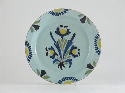 Appraisal: A Delftware plate probably Lambeth painted in polychrome enamels with