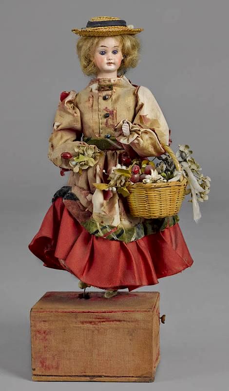 Appraisal: Bisque head automaton doll ca with a musi Bisque head