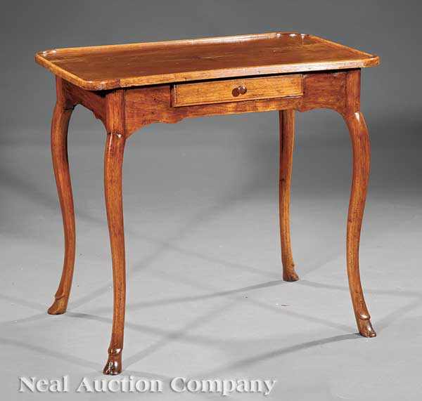 Appraisal: A Provincial Louis XV Walnut Table Th th c molded