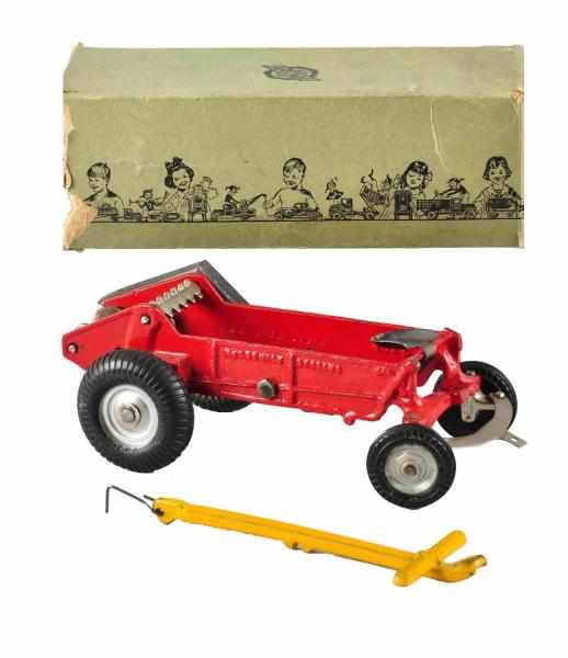 Appraisal: Cast Iron Arcade McCormick-Deering Spreader Toy Description American Includes original