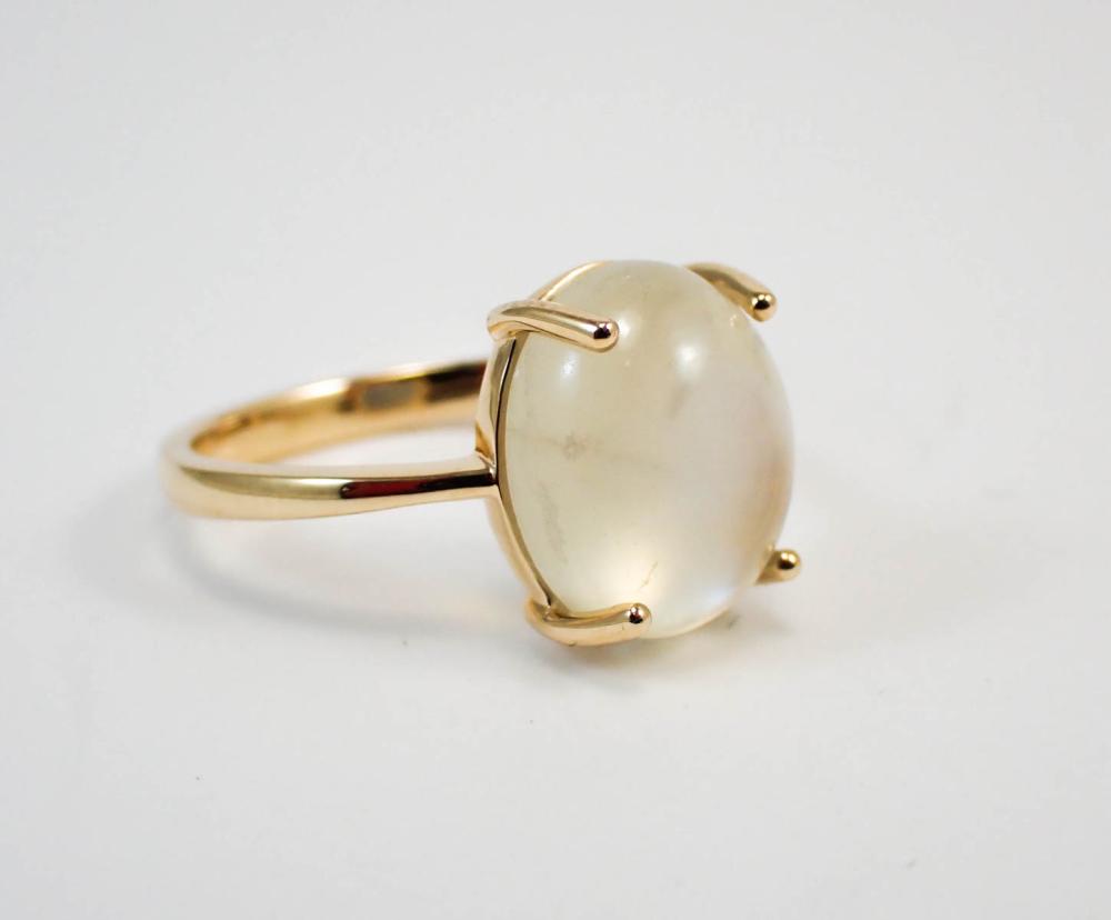 Appraisal: MOONSTONE AND FOURTEEN KARAT GOLD RING with four yellow gold