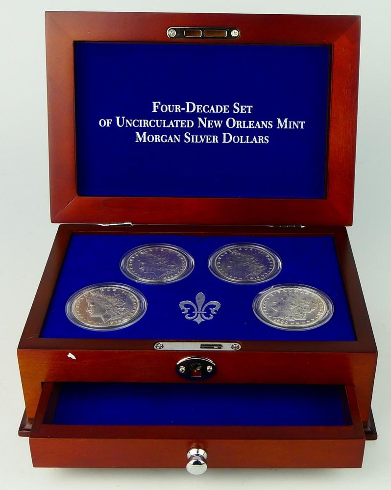 Appraisal: DECADE UNCIRCULATED MORGAN SILVER DOLLARS In a presentation case all