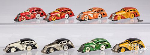 Appraisal: EIGHT MARX TRICKY TAXI WIND-UP CARSEight Marx Tricky Taxi wind-up