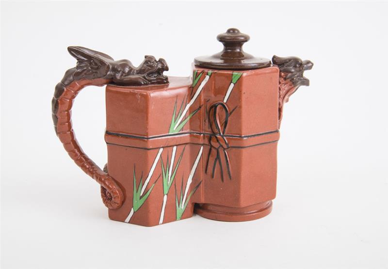 Appraisal: CHRISTOPHER DRESSER ATTRIBUTION Watcombe Terracotta Co Torquay polychrome decorated teapot