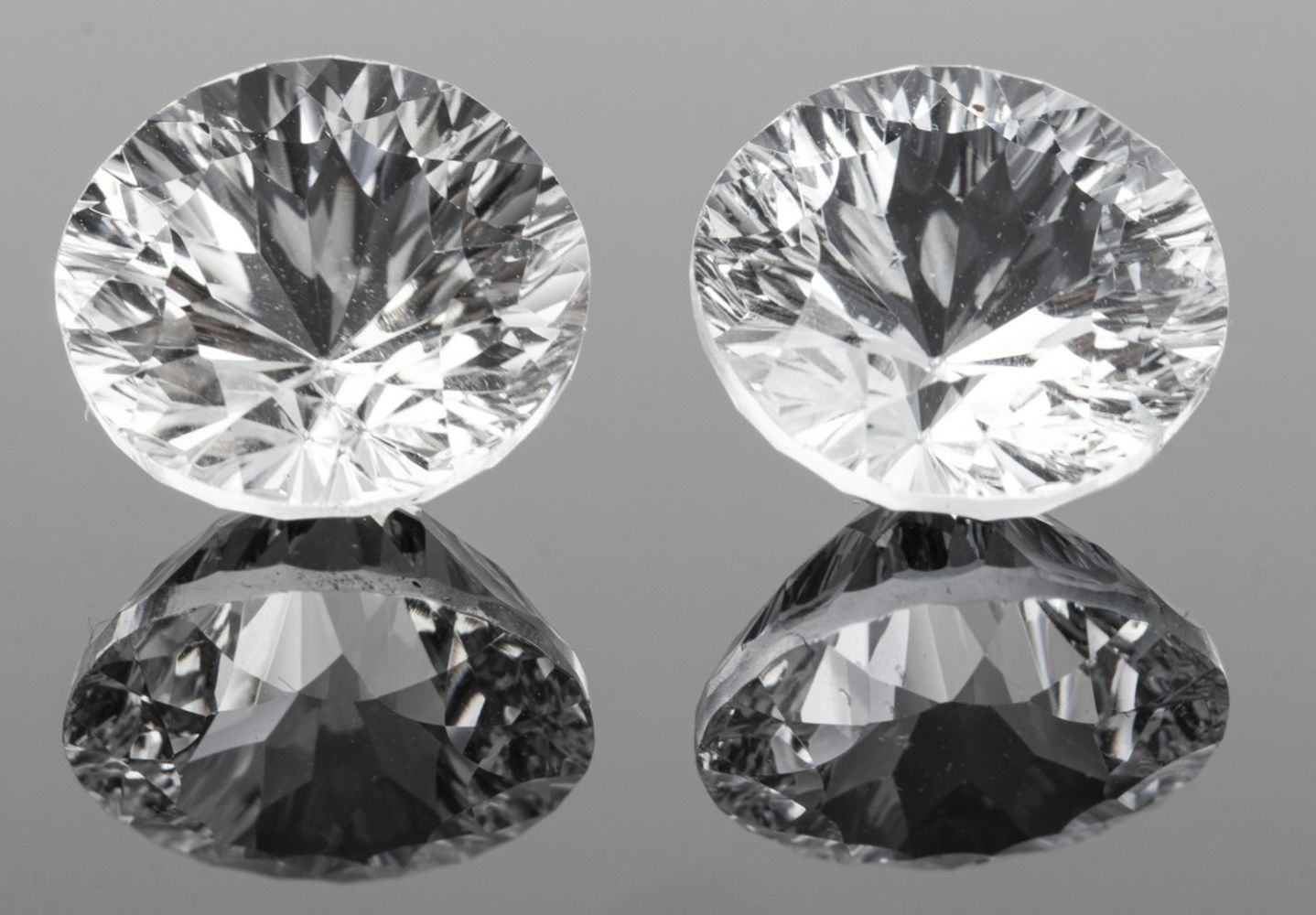 Appraisal: CTTW LOOSE QUANTUM-CUT ROUND WHITE TOPAZ cttw pair of loose