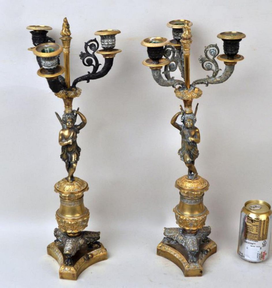 Appraisal: Two French Empire Gilt Bronze Figural Candelabra being an almost