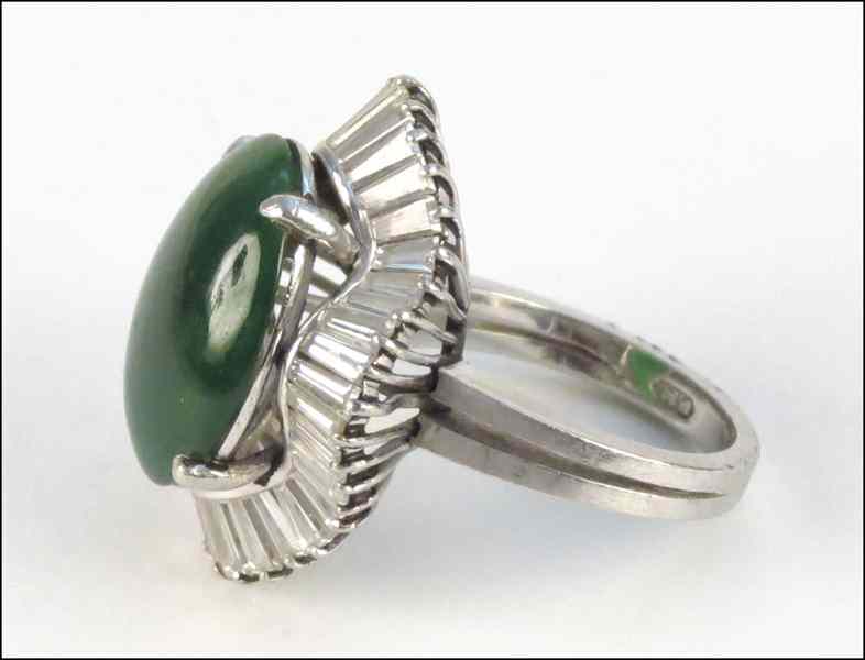 Appraisal: JADEITE PLATINUM AND DIAMOND BALLERINA RING Comprise of one oval