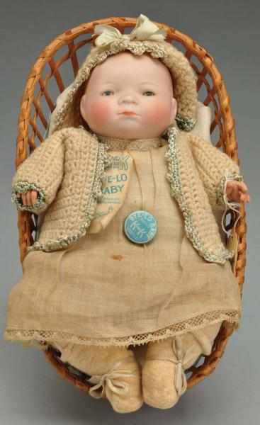 Appraisal: Sweet Bye-Lo Baby Doll in Basket Description Designed by Grace