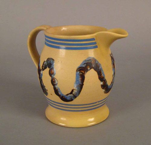 Appraisal: Yelloware pitcher th c with earthworm decoration h