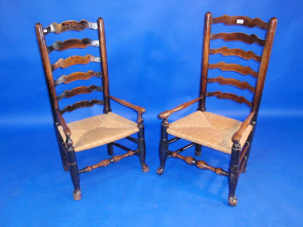 Appraisal: A pair of thC low ladder back chairs with rush