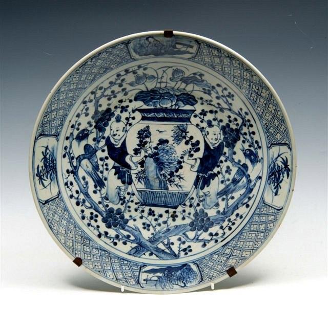 Appraisal: A CHINESE BLUE AND WHITE DISH decorated with two figures