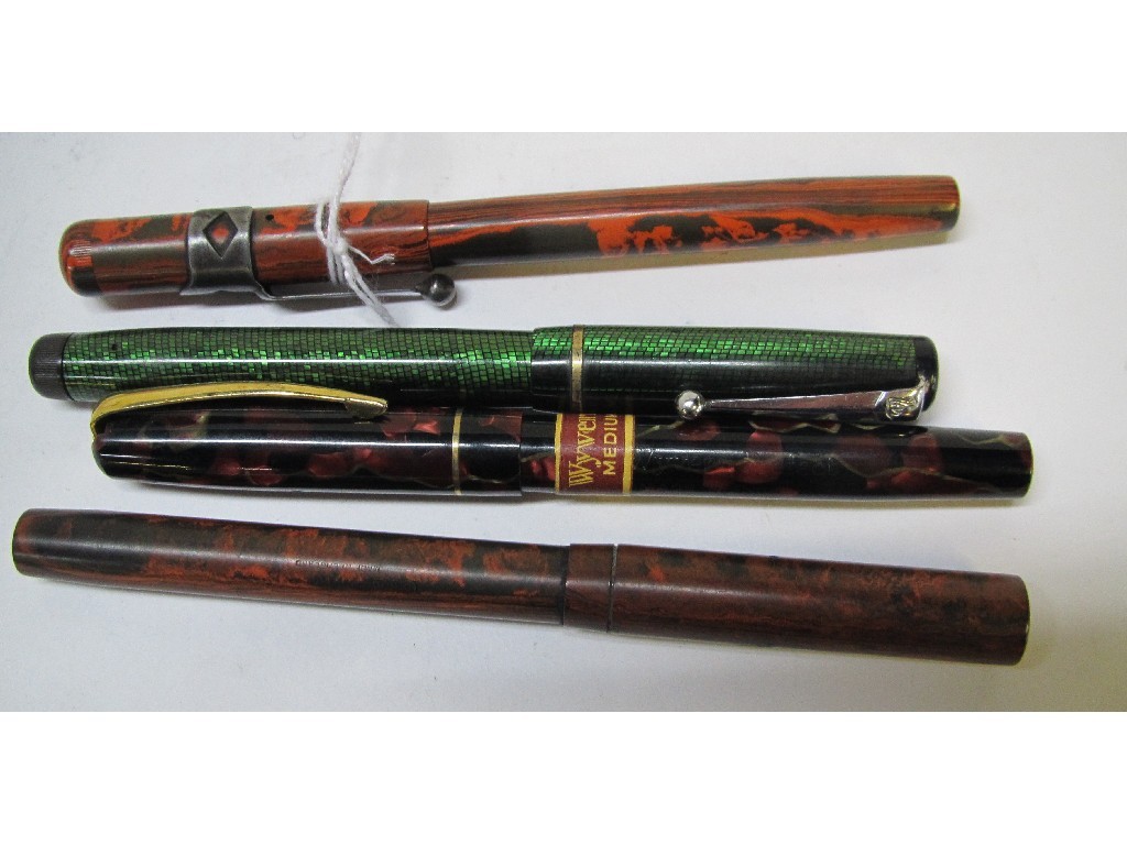 Appraisal: Lot comprising four assorted fountain pens