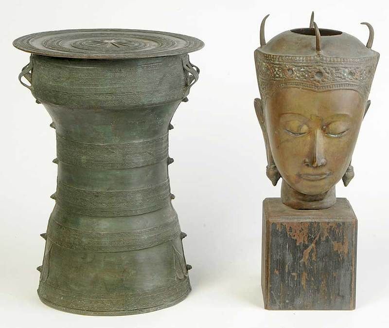 Appraisal: Southeast Asian Buddha Head Rain Drum th century head set