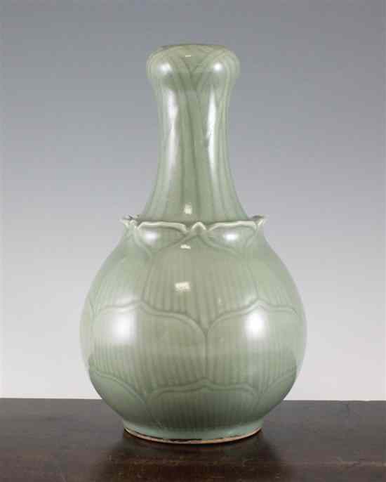 Appraisal: A Chinese celadon glazed lotus moulded bottle vase Yongzheng mark