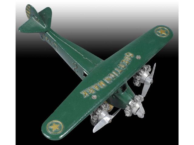 Appraisal: Cast Iron Dent Tri-motor Airplane Toy Description Dark green with