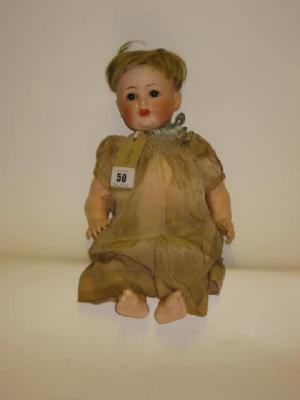 Appraisal: A Kestner bisque Mama doll with brown sleeping eyes open