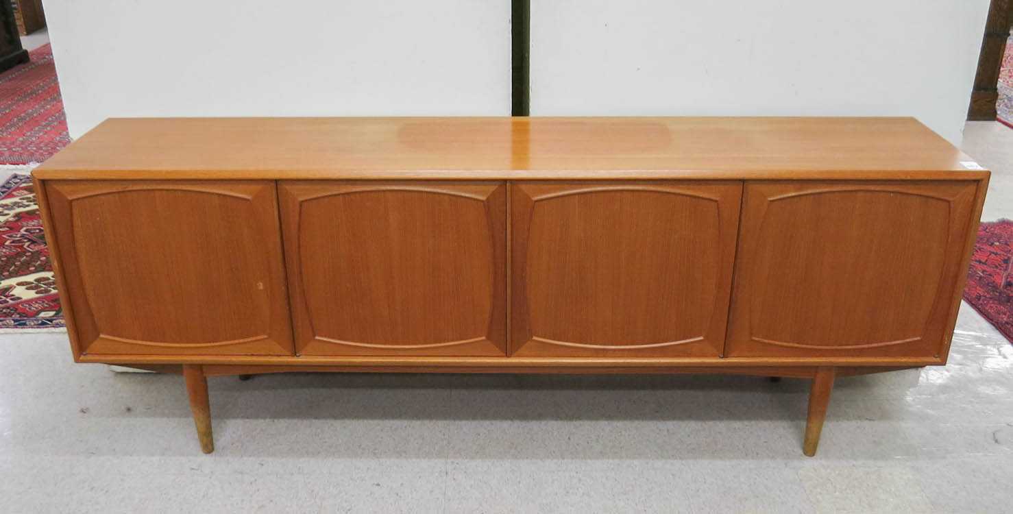 Appraisal: TEAK MID-CENTURY MODERN SIDEBOARD Danish c having four panel doors