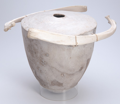 Appraisal: RICK DILLINGHAM Earthenware vessel with two bone fragments attached to