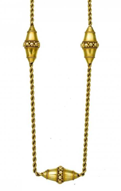 Appraisal: A GOLD ROPE NECKLET with three beaded barrel shaped links