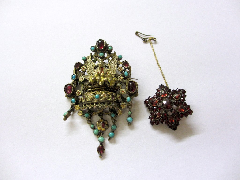 Appraisal: An Austro Hungarian silver gilt pendant brooch set with garnet