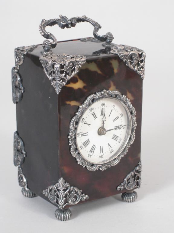 Appraisal: A Victorian silver mounted tortoiseshell cased Carriage Clock with carrying