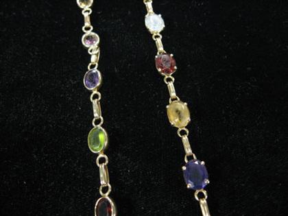 Appraisal: Two semi precious gem set flexible bracelets Each set with