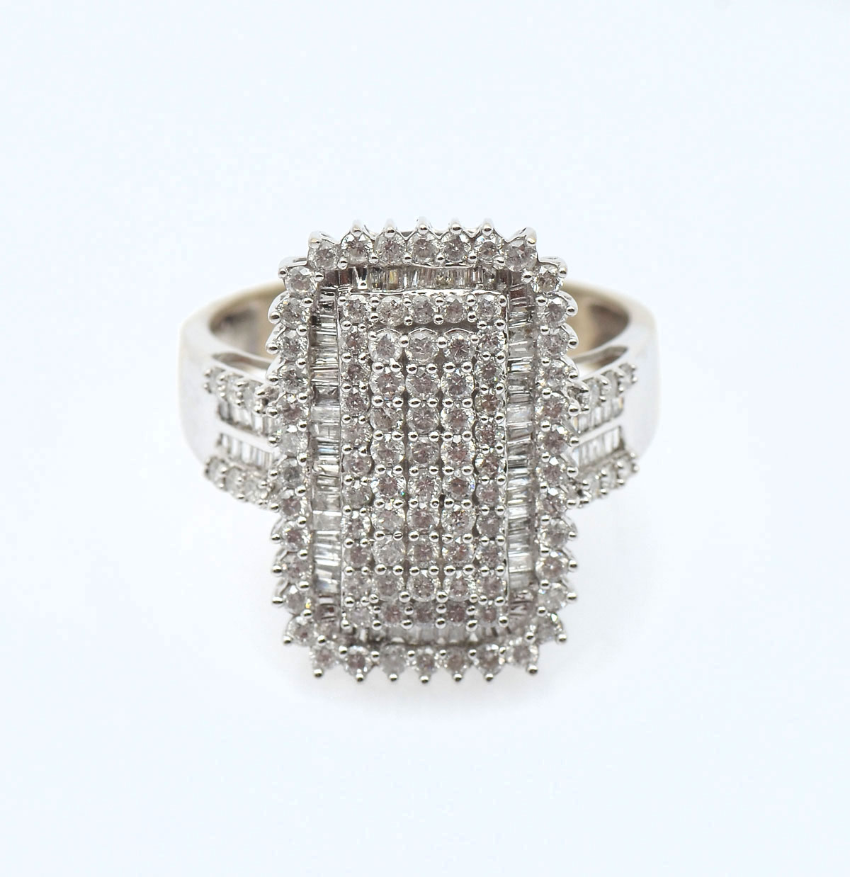 Appraisal: K WHITE GOLD PAVE DIAMOND COCKTAIL RING round brilliant cut