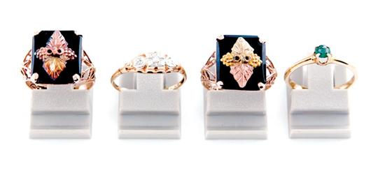 Appraisal: Collection gold rings two pink gold rings set with black