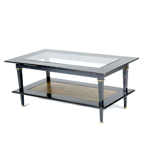 Appraisal: STYLE OF JACQUES ADNET Two-tier coffee table with glass top