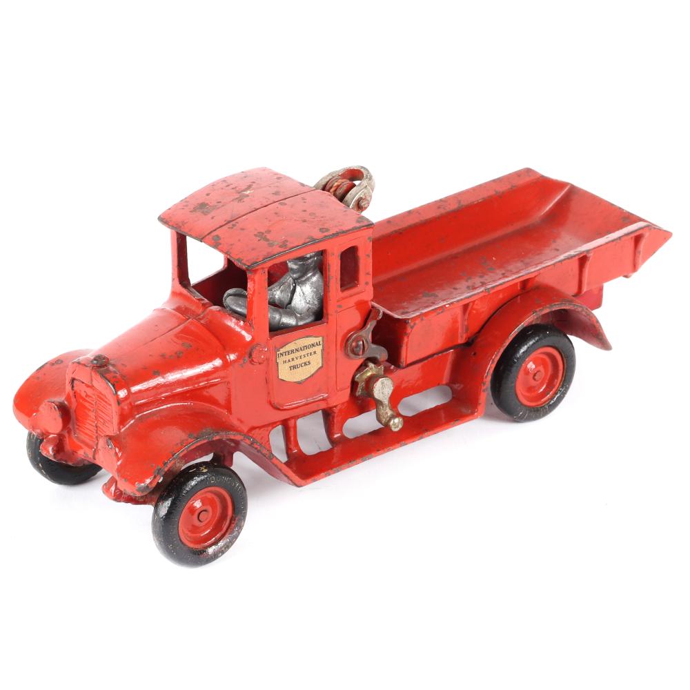 Appraisal: ARCADE CAST IRON RED BABY DUMP INTERNATIONAL HARVESTER TRUCKArcade Cast