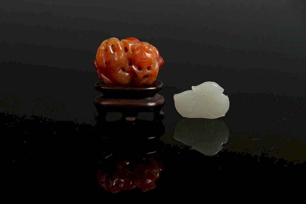 Appraisal: CARNELIAN CARVING AND JADE MANDARIN DUCK TH CENTURY Vividly depicting