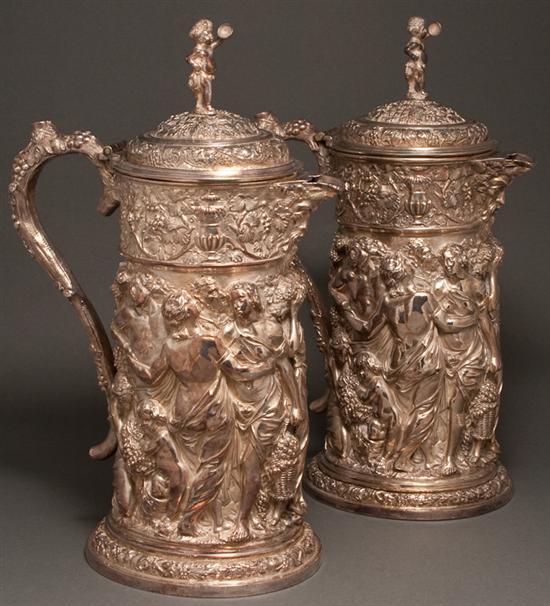 Appraisal: Pair of Neoclassical style repousse silver-plate on copper wine pitchers