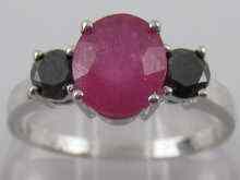 Appraisal: A white metal tests carat gold ruby and black diamond