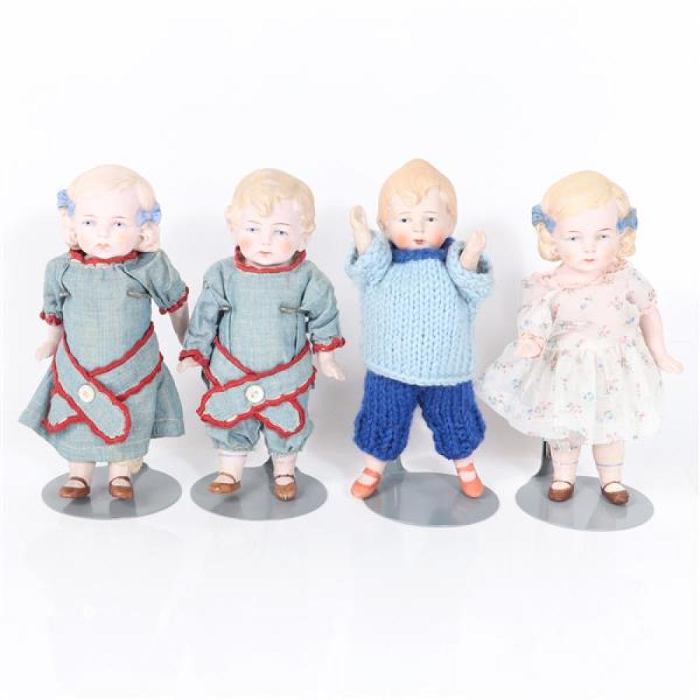 Appraisal: FOUR ALL BISQUE HERTWIG GERMAN CHARACTER BOY AND GIRL CURLY