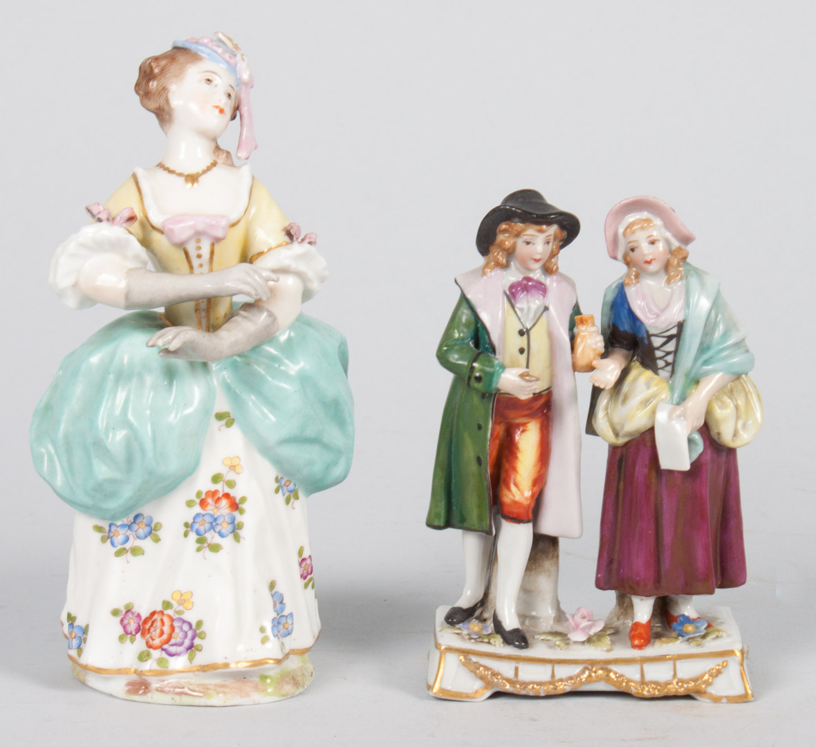 Appraisal: Two Continental porcelain figures Capodimonte porcelain figural group of th