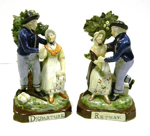 Appraisal: Early Staffordshire figures two pieces ''Departure'' gentleman bidding wife farewell