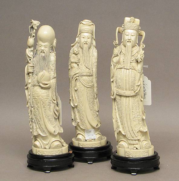 Appraisal: A carved ivory set of the 'Three Stars of Happiness'