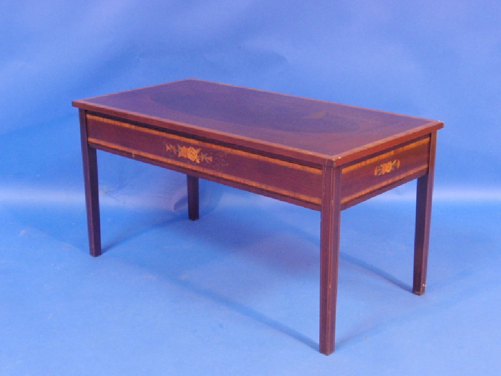 Appraisal: A coffee table made by South Devon Furniture Ltd