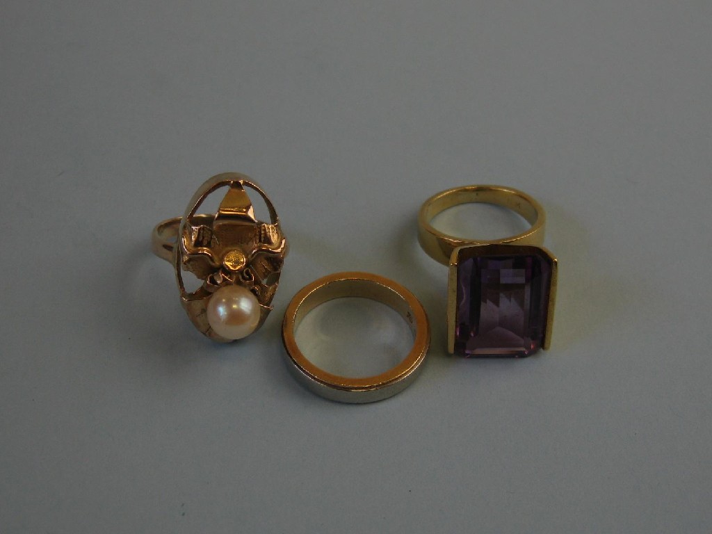 Appraisal: An Amethyst Dress Ring the step-cut stone in contemporary k