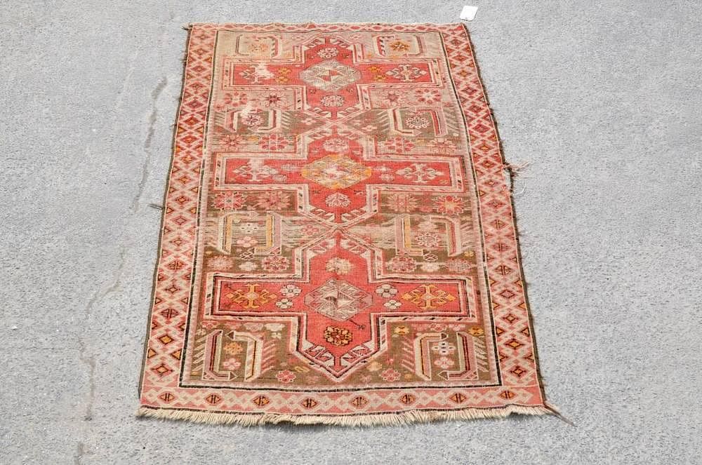 Appraisal: Turkish Geometric Rug Turkish rug in a red and orange