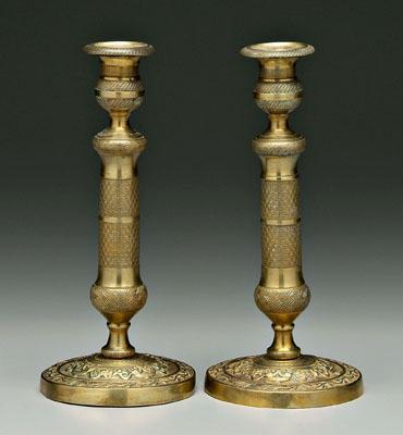 Appraisal: Pair Louis XVI brass candlesticks finely textured surfaces with circular