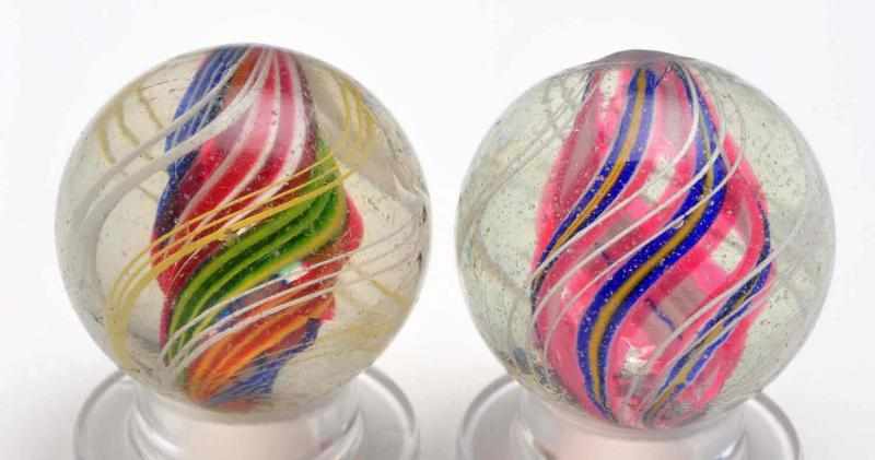 Appraisal: Lot of Divided Core Swirl Marbles Description Lot includes two