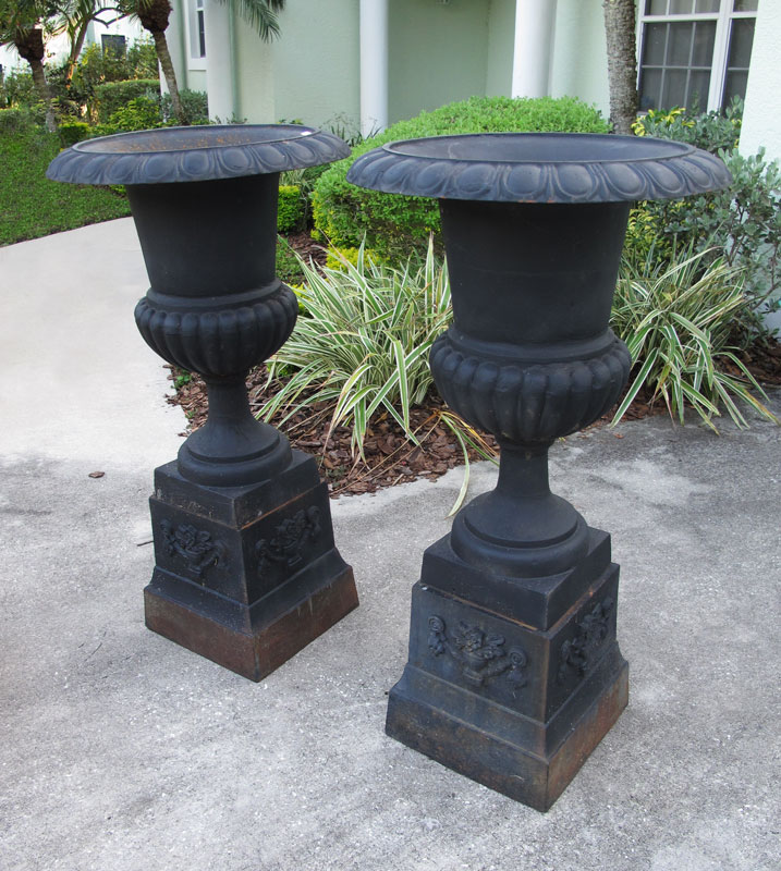 Appraisal: PAIR OF CAST IRON GARDEN URNS Black painted finish ''