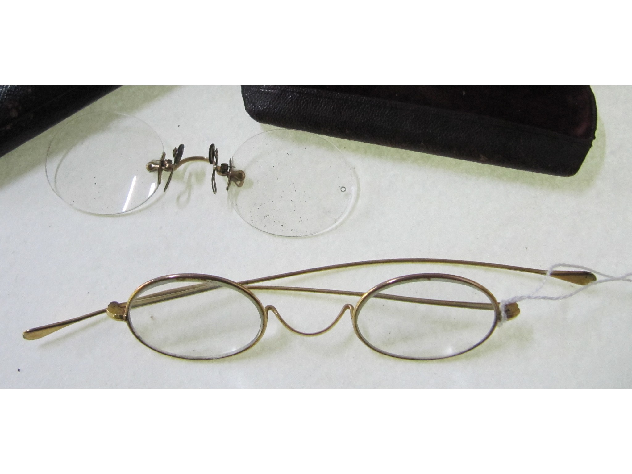 Appraisal: A lot comprising a pair of gilt metal Georgian spectacles