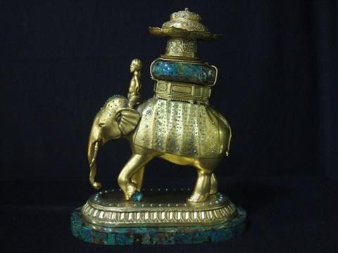 Appraisal: CONTINENTAL ORMULU AND AZUREMALACHITE ELEPHANT In the style of Barbedienne