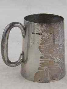 Appraisal: A silver mug of tapering form with C handle Sheffield